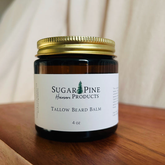 Small jar of Sugar Pine Tallow Beard Balm on a wooden surface