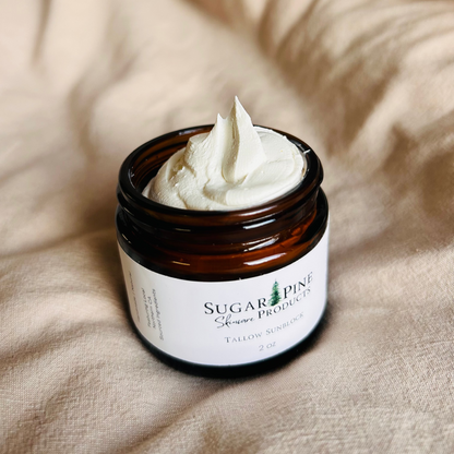 glass jar of tallow sunblock from sugar pine products