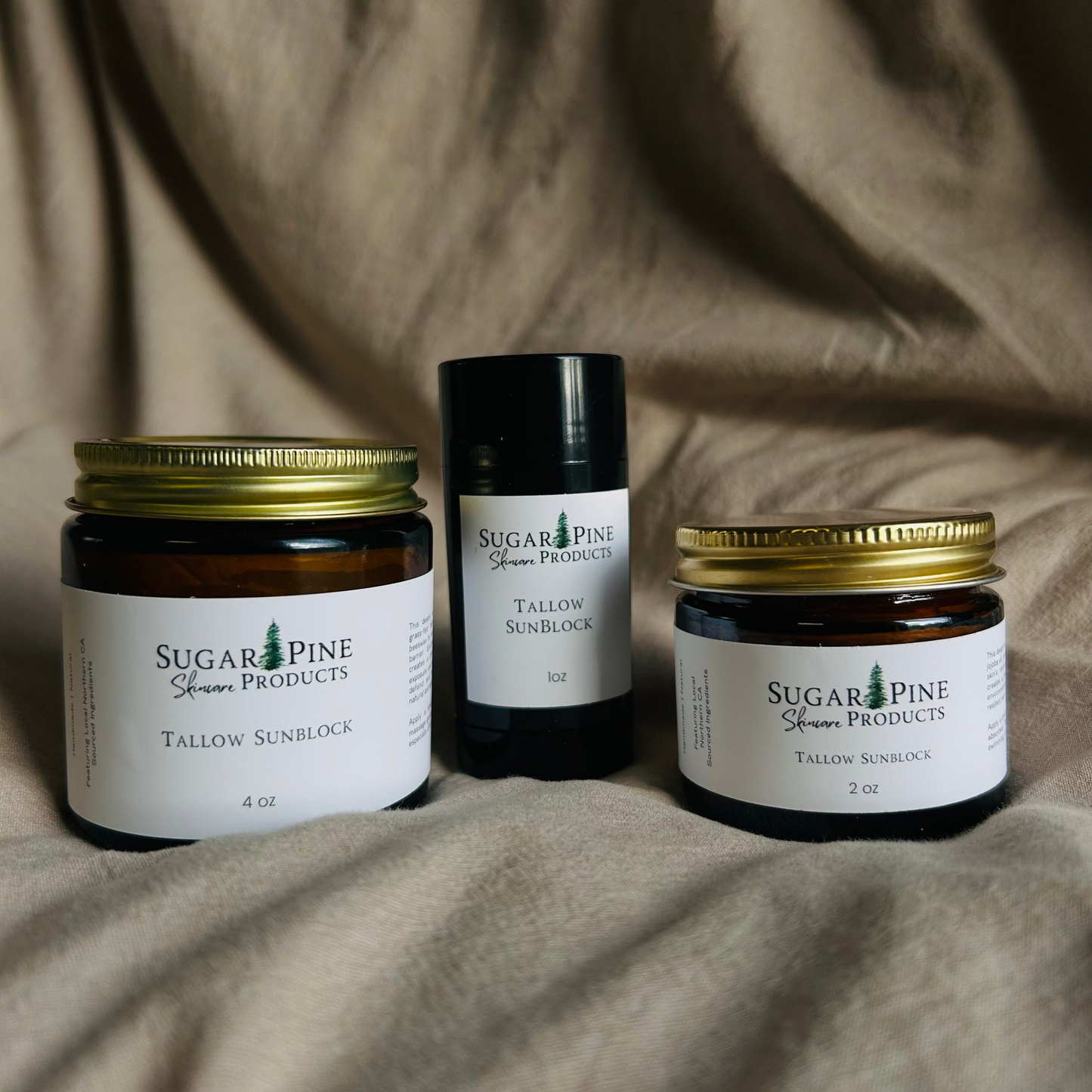 glass jar of tallow sunblock from sugar pine products