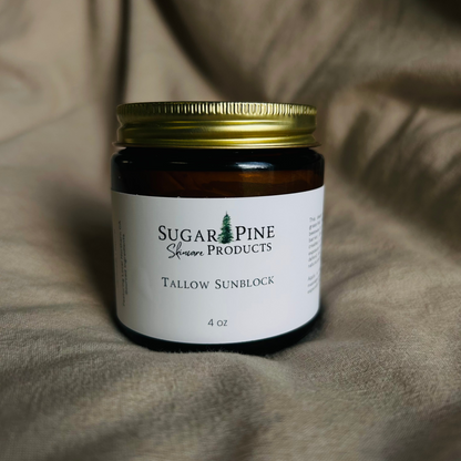 glass jar of tallow sunblock from sugar pine products